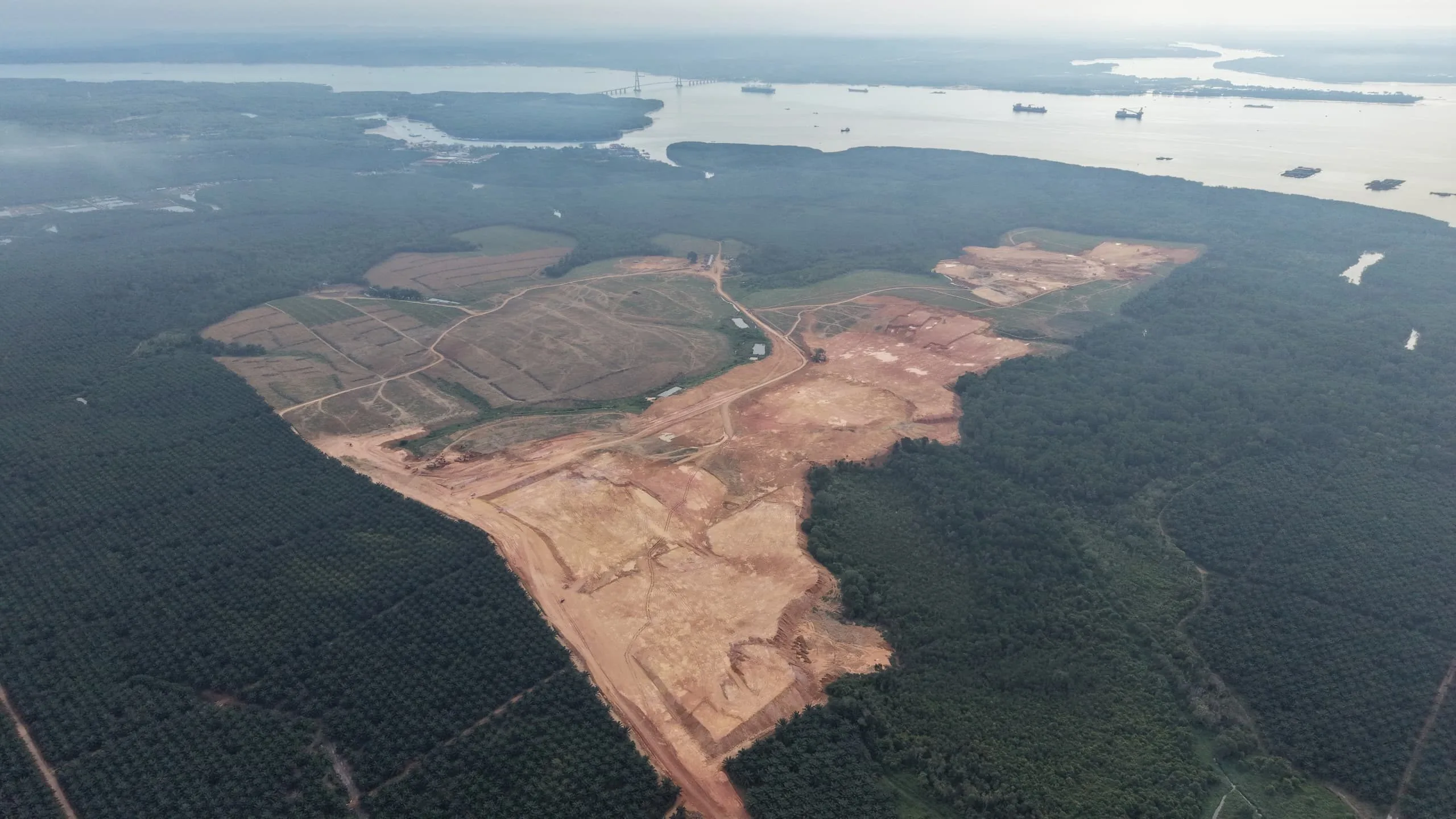 Alpha Austin Industrial Park earthworks photograph dated 10 April 2026, Tanjung Langsat, Johor