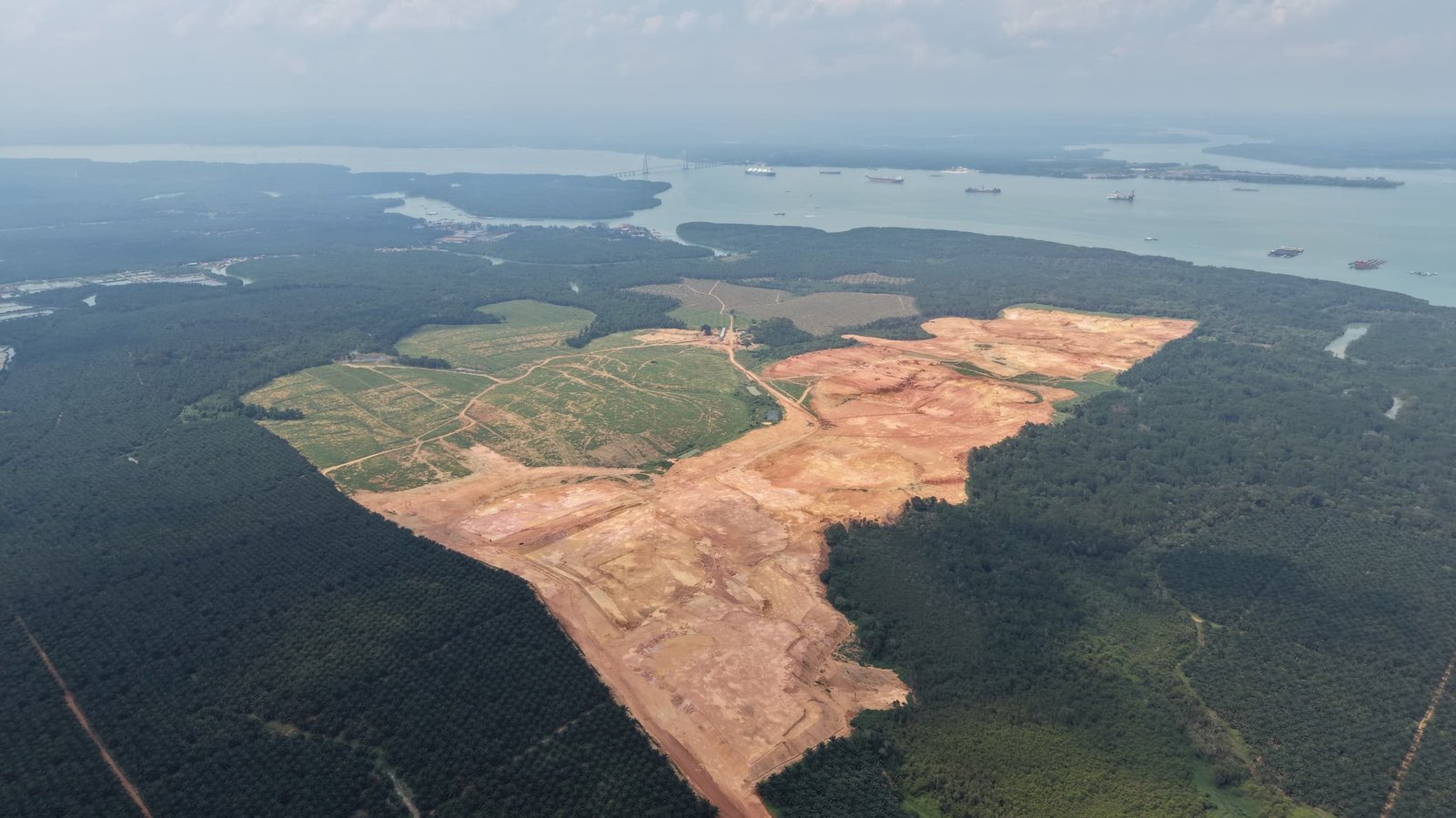 Alpha Austin Industrial Park earthworks site progress photograph published 14 May 2026, Tanjung Langsat, Johor