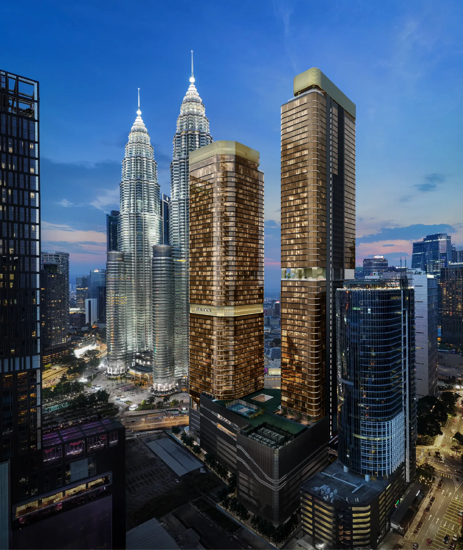 CloutHaus KLCC two-tower elevation at night beside the Petronas Twin Towers, Jalan P. Ramlee, Kuala Lumpur