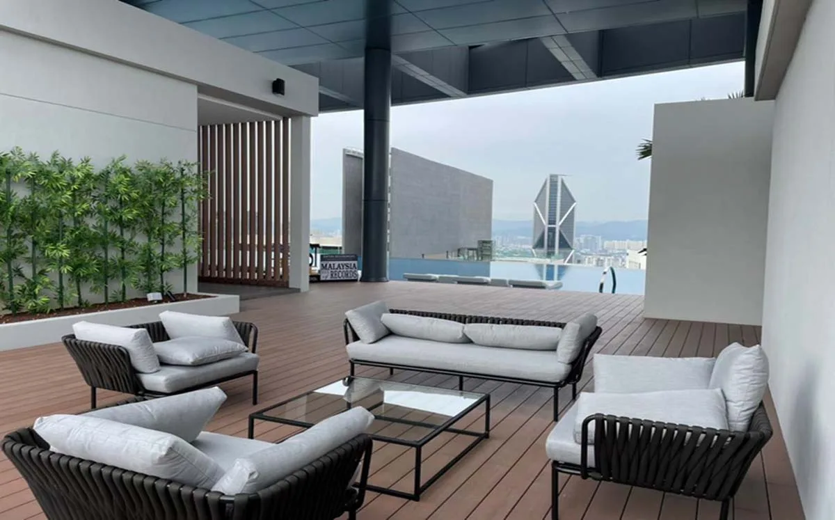 Photograph of the completed Level 51 sky lounge beside the rooftop pool at Eaton Residences @ KLCC