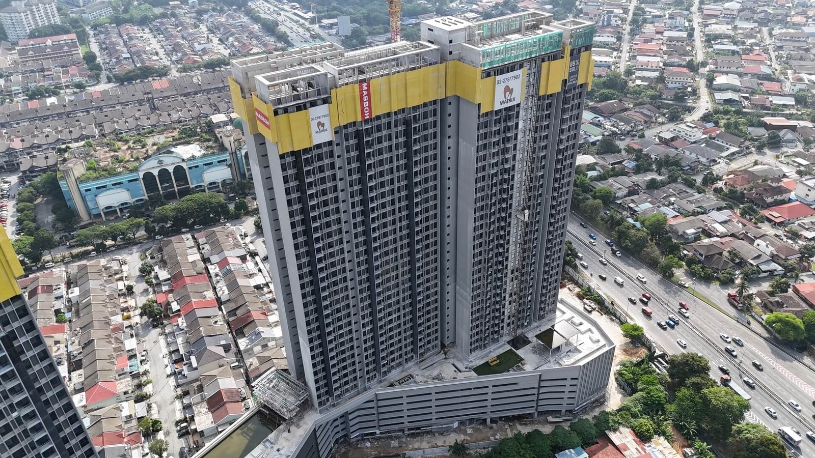 Levia Residence tower facade under construction, July 2026 site photograph, Cheras, Kuala Lumpur
