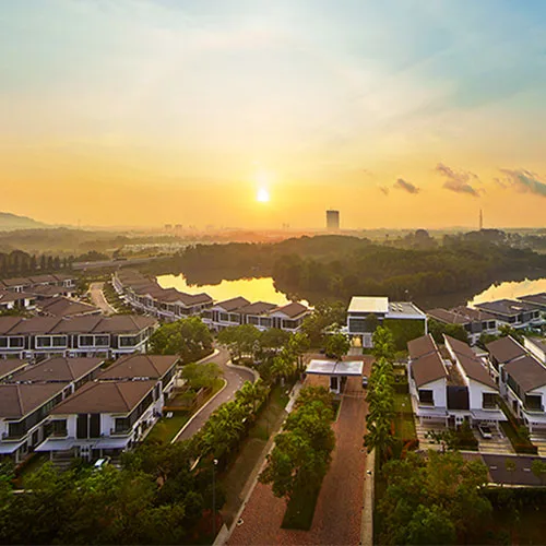 Waterfront homes and mangroves on the rivers of Senibong Cove at sunset, Masai, Johor