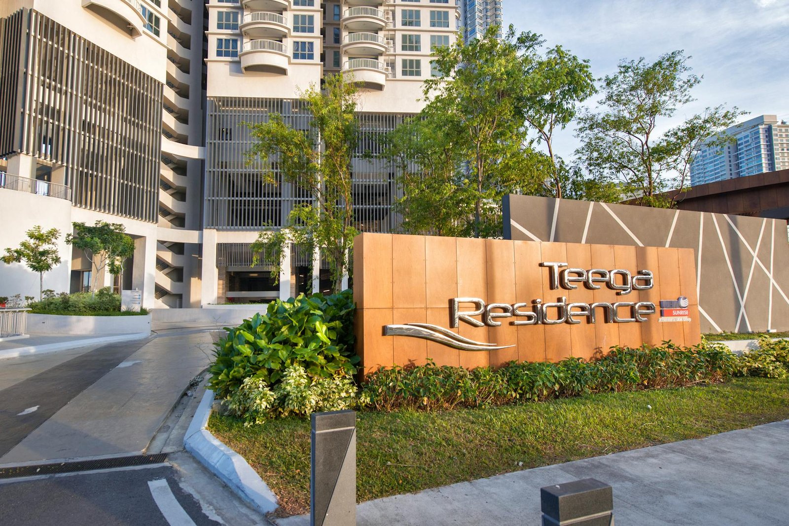 Teega Residence / Teega Suites Teega Residences entrance statement