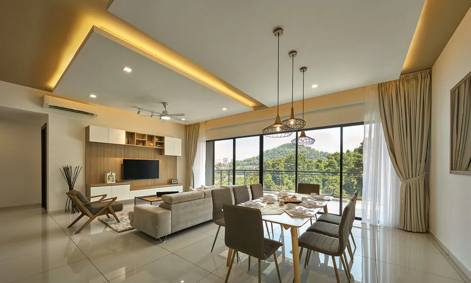 Alila 2 show unit living and dining room with full-height glazing to the hills, Tanjung Bungah — actual photo