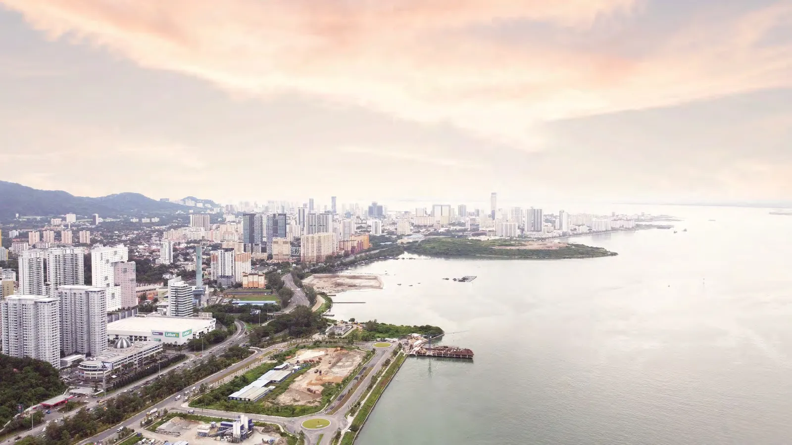 Alton Skyvillas aerial context over Jelutong toward KOMTAR and George Town, Penang Island