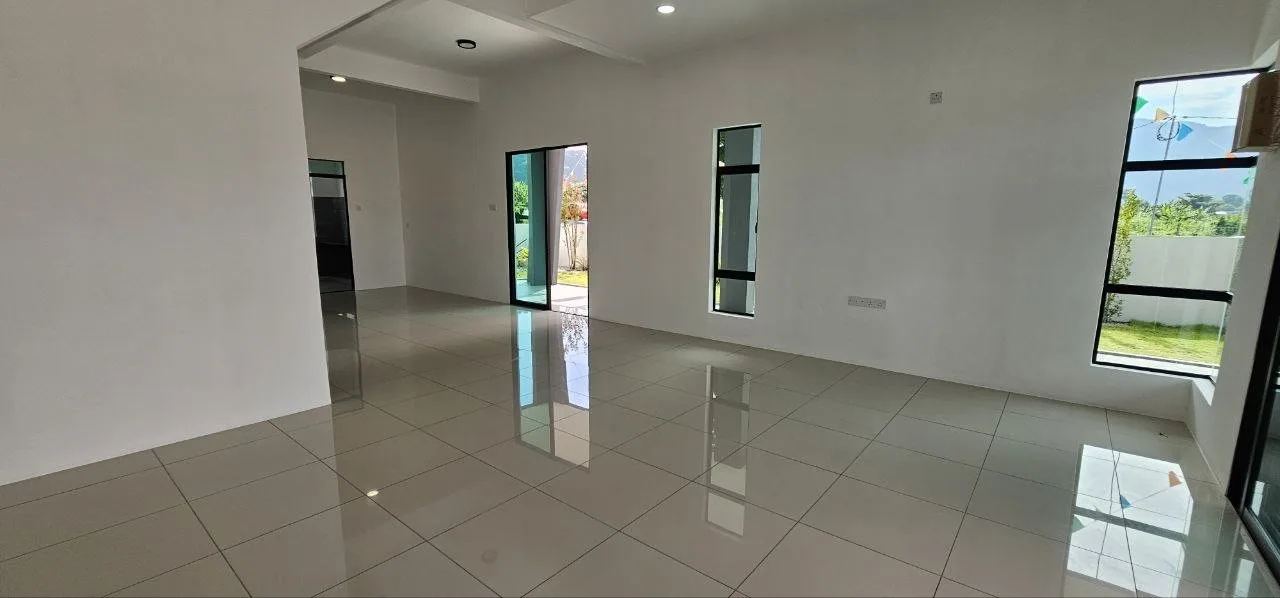 Ground-floor living and dining area of the terrace show unit at Ampang Cove by LYS Realty Sdn Bhd, Ampang, Ipoh, Perak