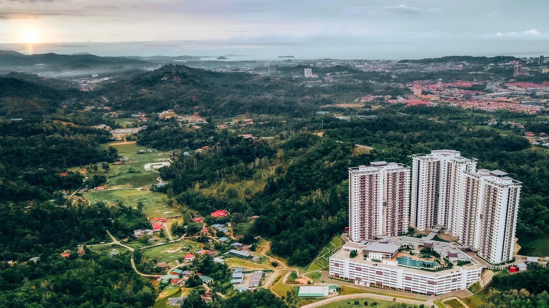 Aerial view of the hilltop towers, looking towards the coast, from the developer’s brochure at Bukit Bantayan Residences, Inanam, Kota Kinabalu, Sabah