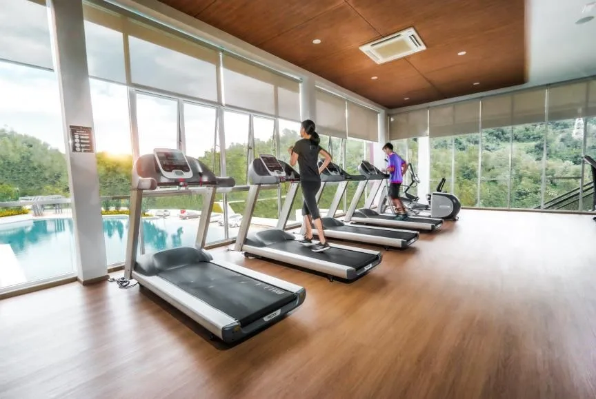 The gymnasium overlooking the pool, from the developer’s brochure at Bukit Bantayan Residences, Inanam, Kota Kinabalu, Sabah