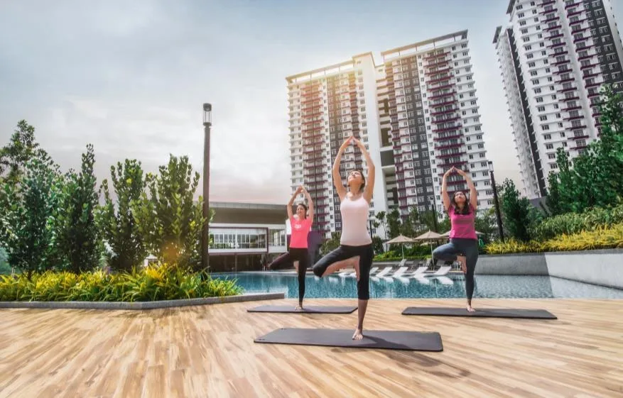 The yoga deck beside the pool, with the towers behind, from the developer’s brochure at Bukit Bantayan Residences, Inanam, Kota Kinabalu, Sabah