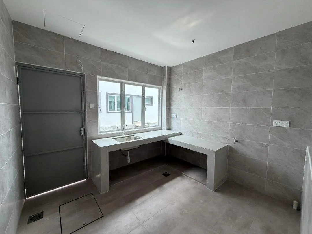 Tiled wet kitchen with concrete counter in the Desa Rishah Indah show house, Desa Rishah, Ipoh, Perak