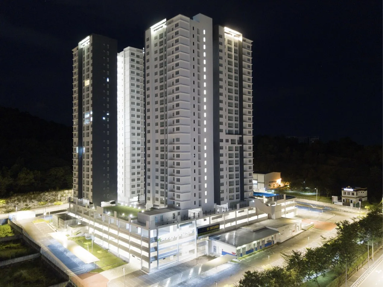 Emerald Residence condominium blocks lit at night, aerial photo, Teluk Kumbar, Penang