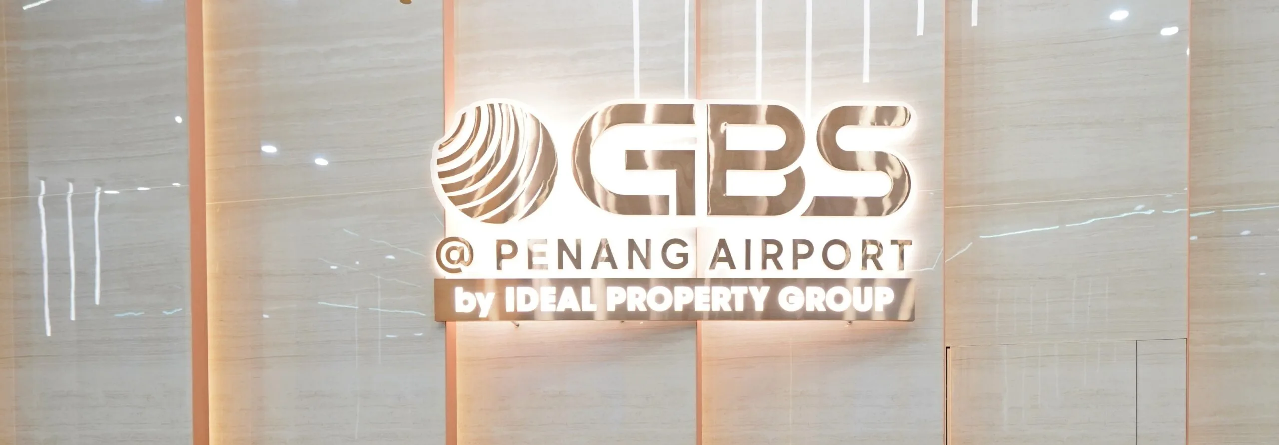 Lobby wall signage reading GBS @ Penang Airport by Ideal Property Group, Bayan Lepas, Penang
