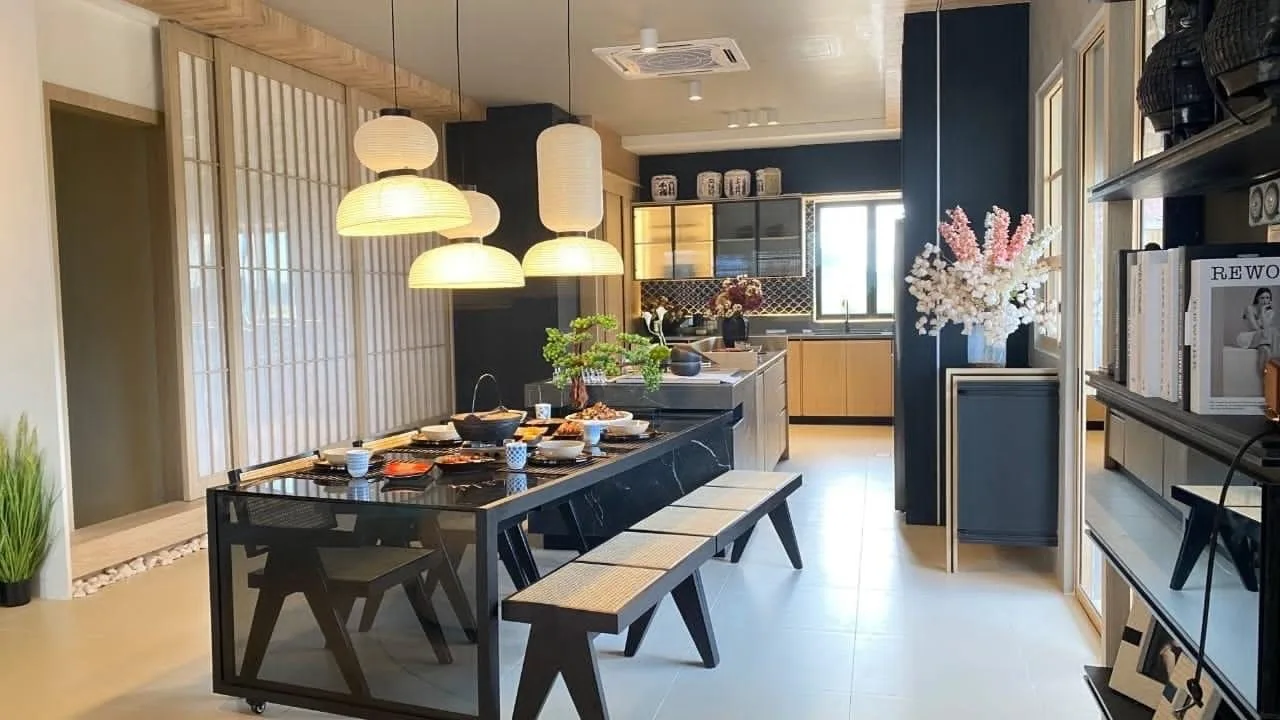 Dining area and kitchen in the Jia @ Ipoh South show house by Team Keris, Ipoh, Perak