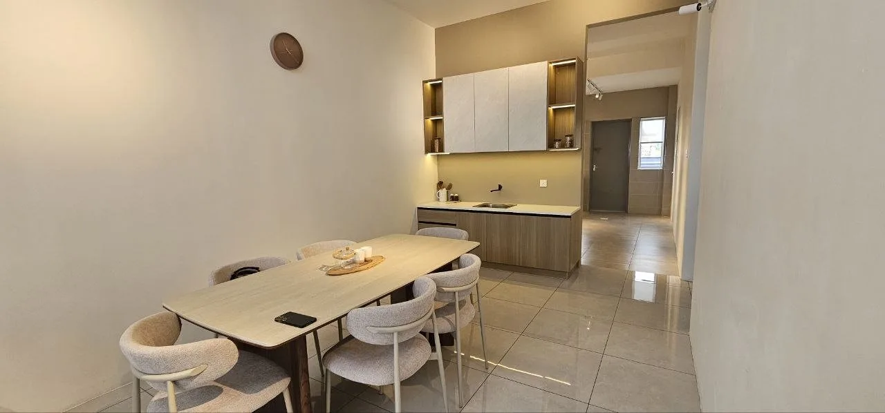 Dining area and kitchen of the Klemeru Phase 4 show house, Chepor, Ipoh, Perak