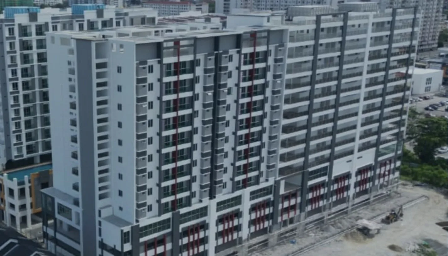 Aerial photograph of the Marminton Homes condominium block near completion, posted by the developer in July 2022, Raja Uda, Butterworth, Penang