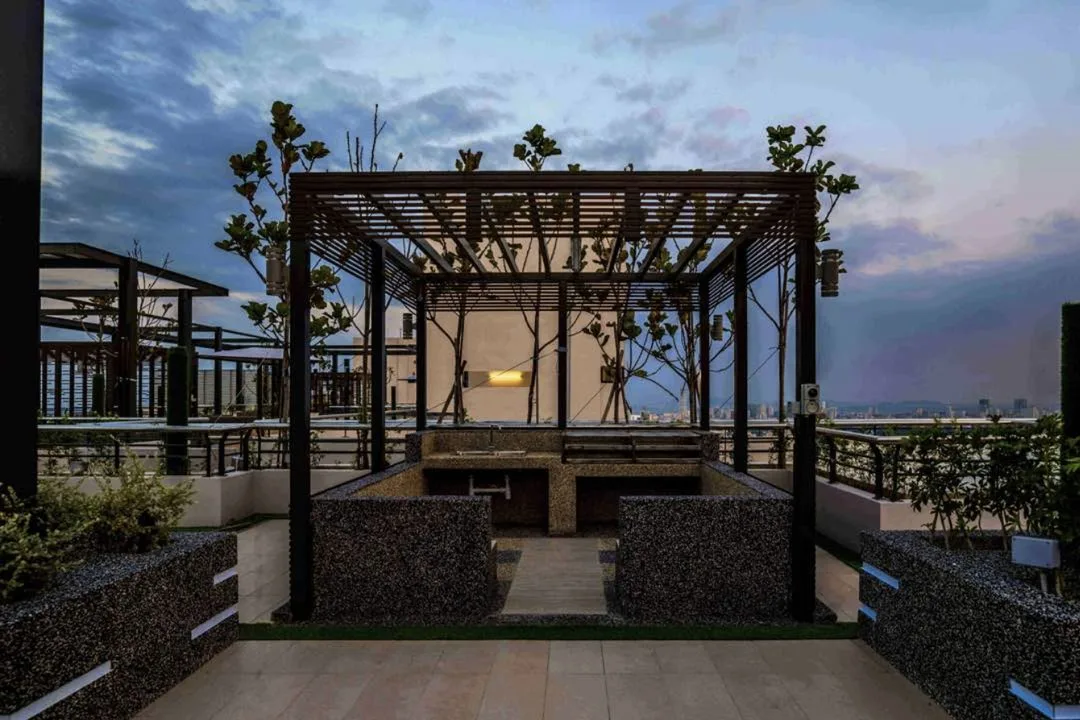 Mont Residence pergola pavilion with a built-in counter on an upper-level deck, Tanjung Tokong, Penang