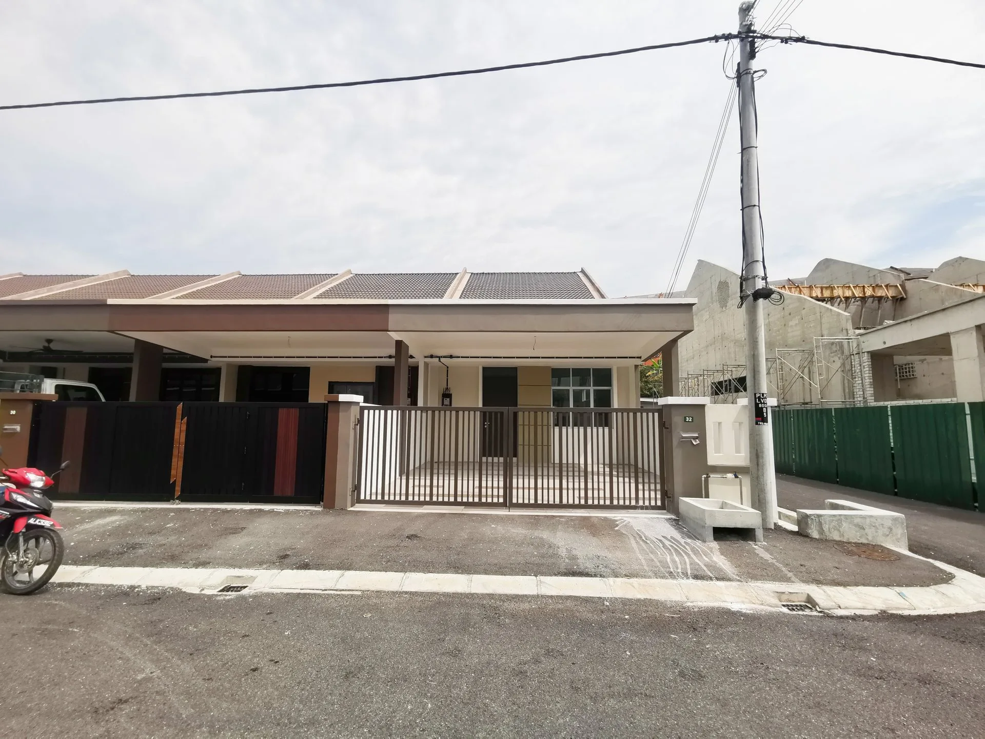 Completed 1.5-storey terrace houses with gates at Pearl Garden Phase 2A, Panorama Lapangan Mutiara, Ipoh, Perak