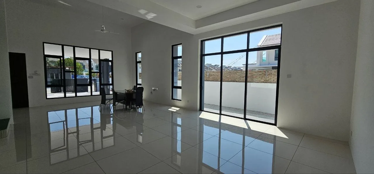 Living hall with full-height windows in the Pinggiran Pengkalan Bayu 2.5-storey semi-D show house, Ipoh