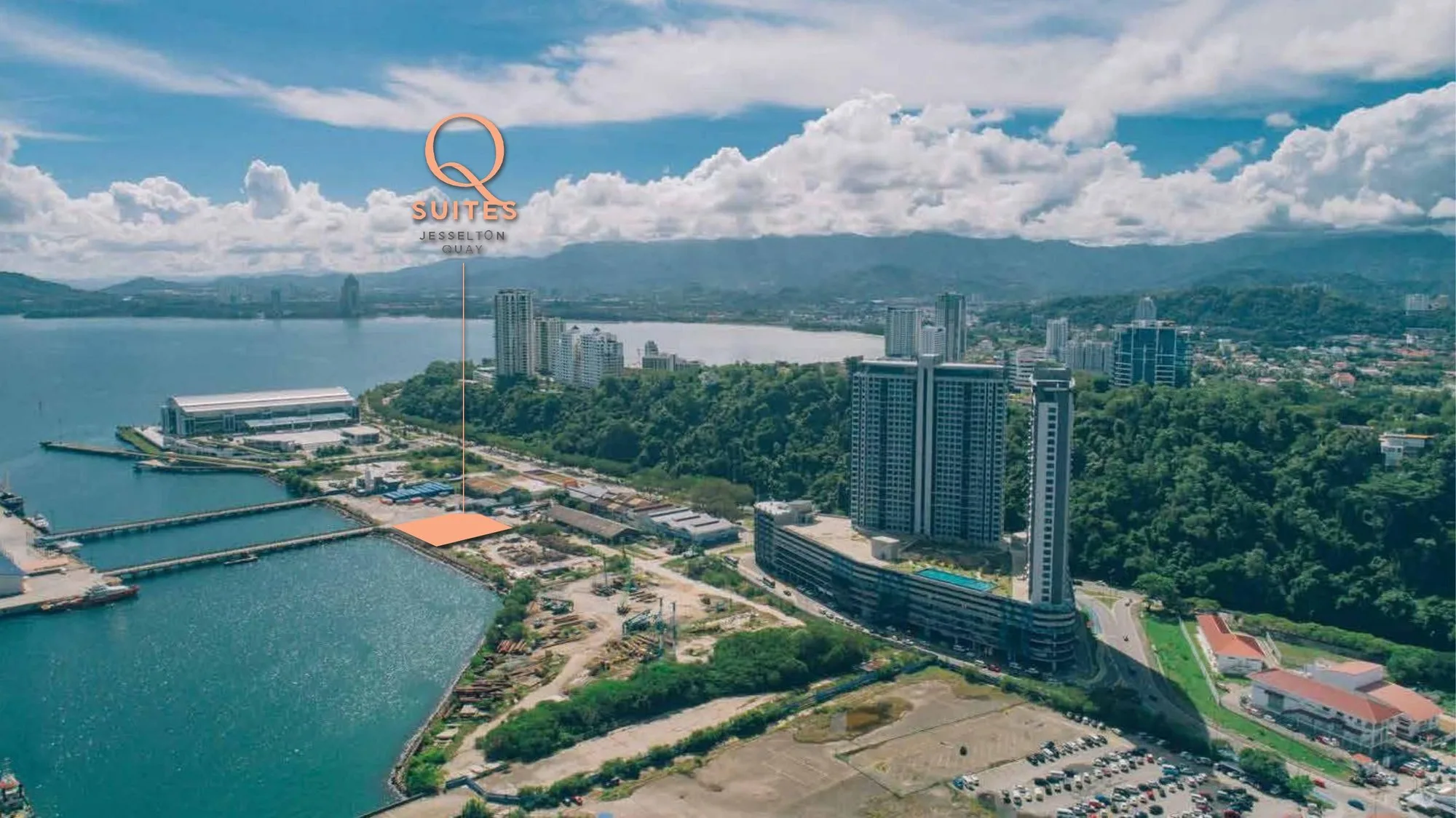 Aerial photo with the Q Suites site marked in orange and the completed first-phase towers on the right, from the developer’s presentation (undated) at Q Suites @ Jesselton Quay, Jalan Tun Fuad Stephens, Kota Kinabalu, Sabah