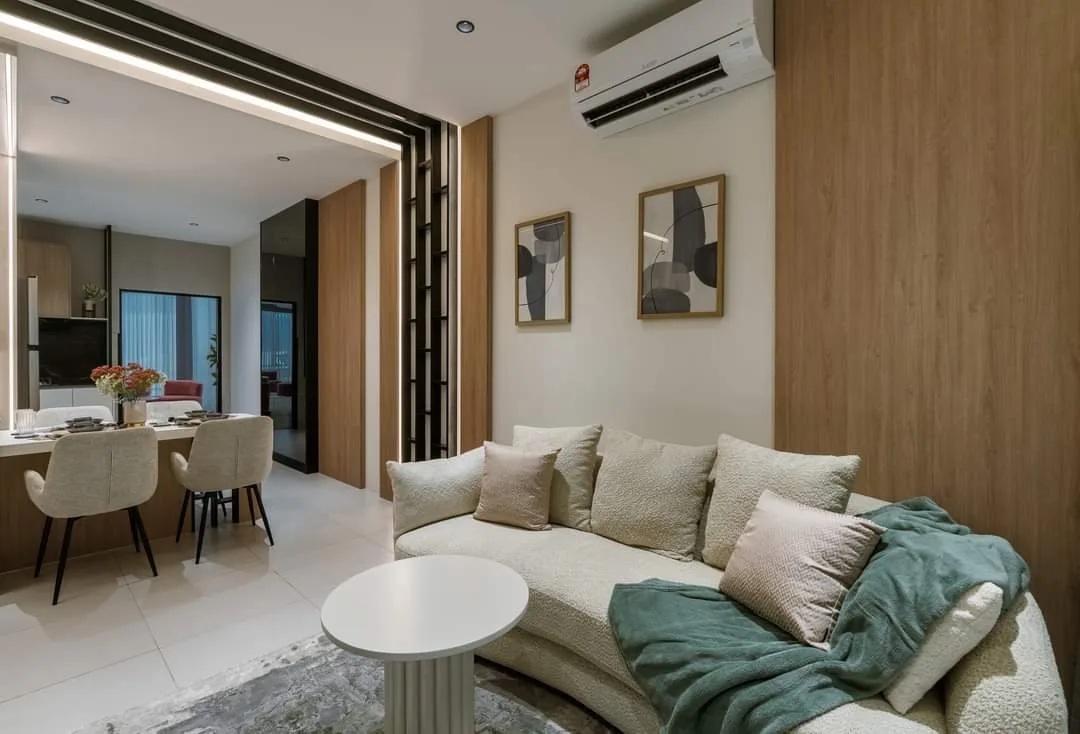 Show unit living room with air-conditioner of the 712 sq ft Type A1 at Raffles 188, Ipoh, Perak