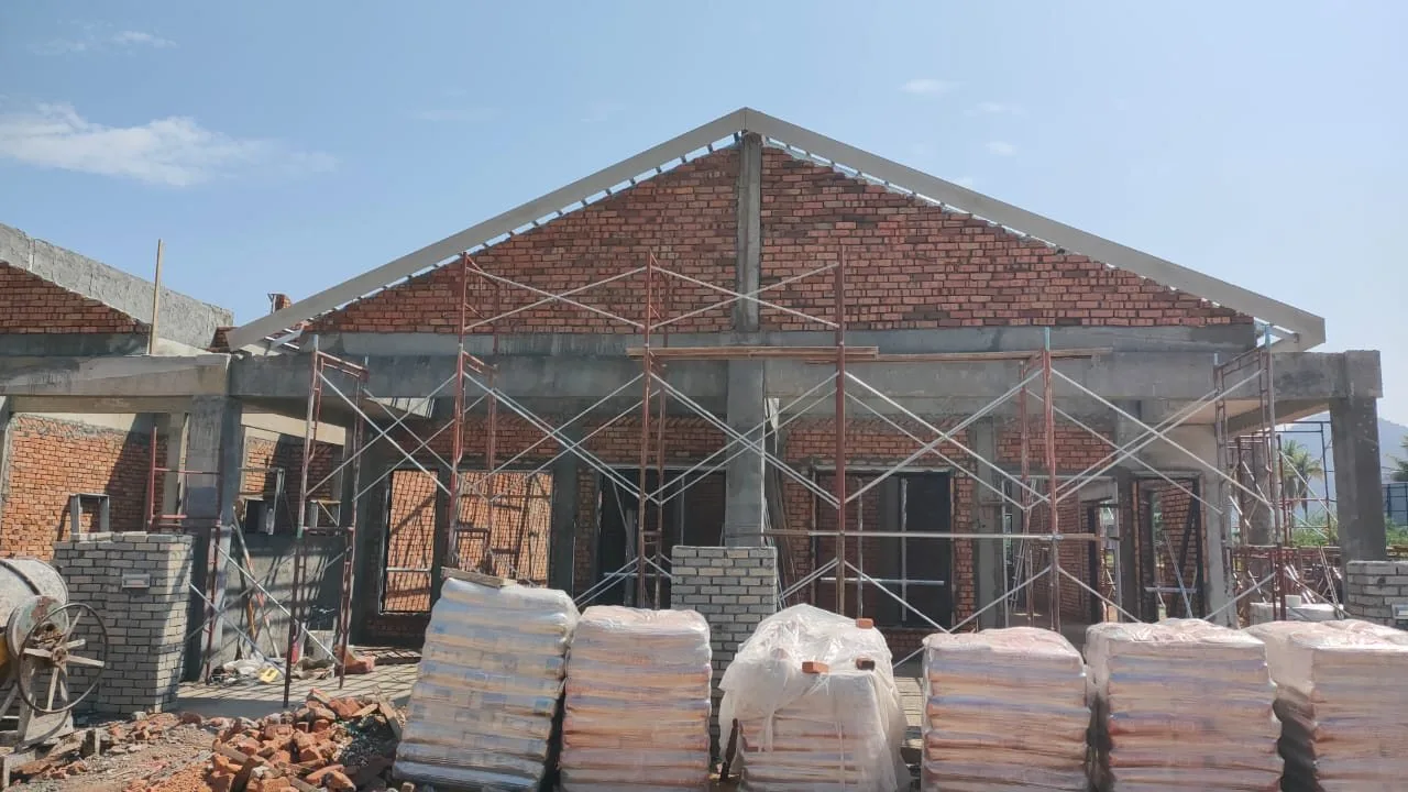 Brickwork and roof framing on a terrace block at Raia Saujana III by Artana Properties, Simpang Pulai, Ipoh