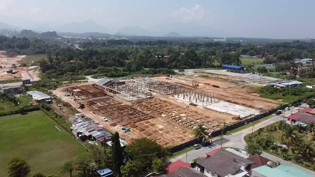 Drone view over Raia Saujana III terrace house site next to Taman Seri Raia, Simpang Pulai, Ipoh