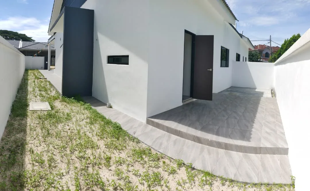 Rear yard and side passage of a single-storey semi-detached house at Taman Anda by 3Peak Construction Sdn Bhd, Tasek, Ipoh, Perak