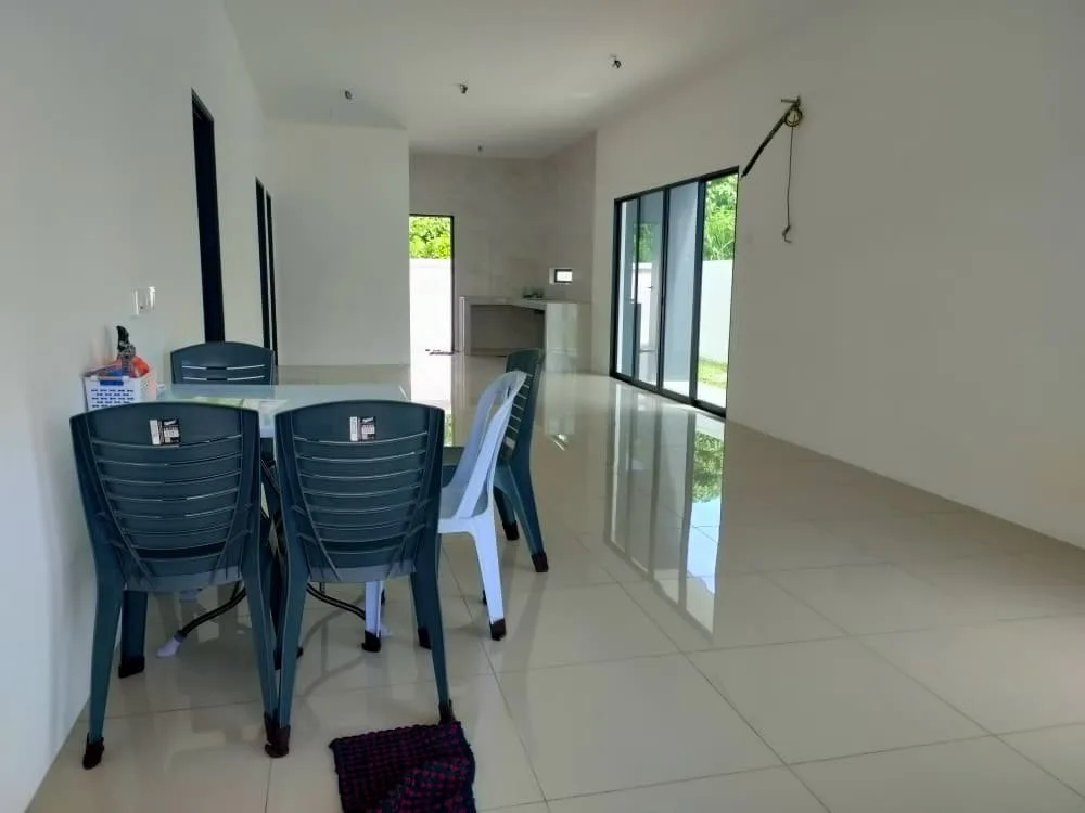 Living and dining area inside a single-storey semi-D show house at Taman Anda by 3Peak Construction Sdn Bhd, Tasek, Ipoh, Perak