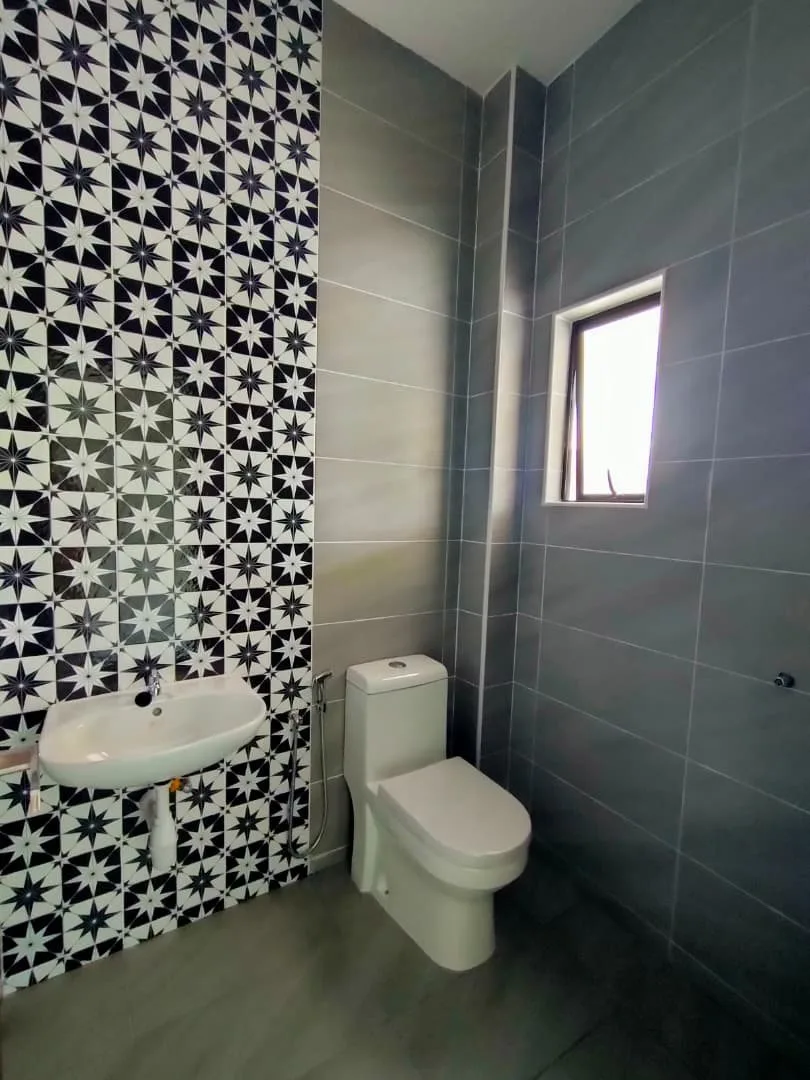 Fully tiled master bathroom in a single-storey semi-D at Taman Anda by 3Peak Construction Sdn Bhd, Tasek, Ipoh, Perak