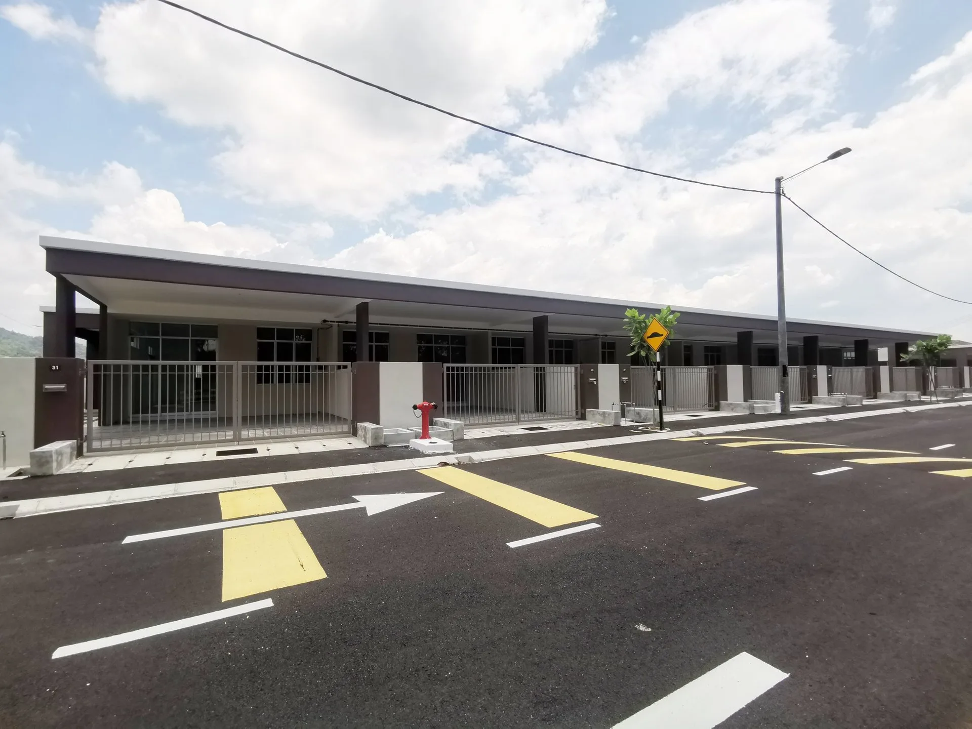 Completed terrace houses and new estate road at Taman Gopeng Mewah, Gopeng, Perak, March 2026