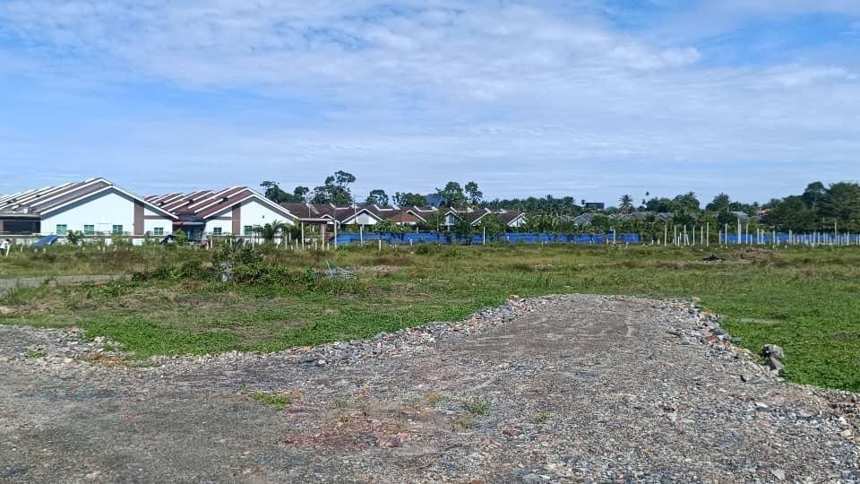 The cleared site of Taman Kamunting Permaisuri next to existing houses, Kamunting, Taiping, Perak