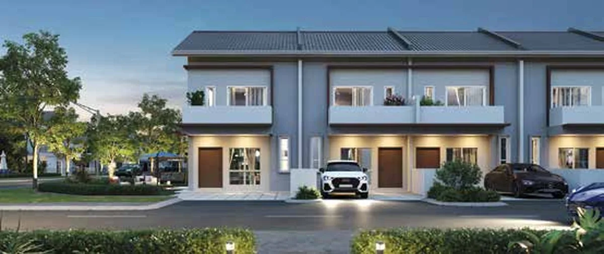 Artist’s impression: the terrace row seen from the street at dusk, from the developer’s brochure at Taman Lagun Ria, Tuaran, Sabah