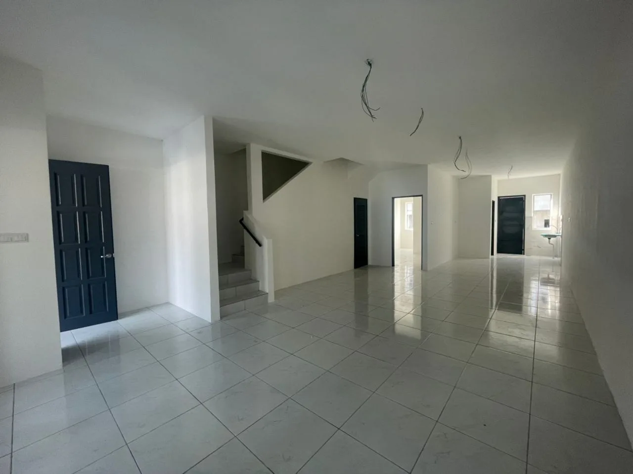 Ground-floor living area of a completed double-storey terrace house at Taman Sejahtera, Kuala Kangsar, Perak