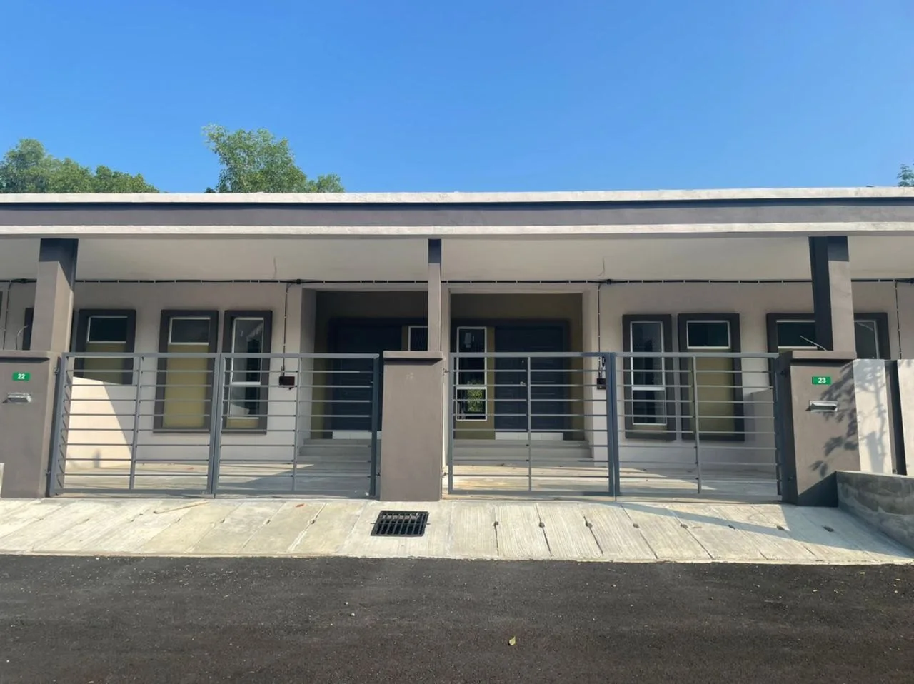 Row of completed single-storey terrace houses at Taman Sejahtera, Kuala Kangsar, Perak
