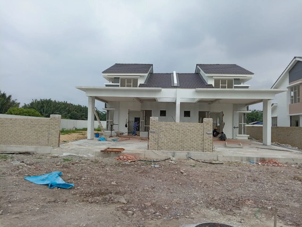 Single-storey semi-detached houses under construction at Taman Serai Perdana by Ihsan Ceria Sdn Bhd, Bagan Serai, Perak, photographed in May 2024