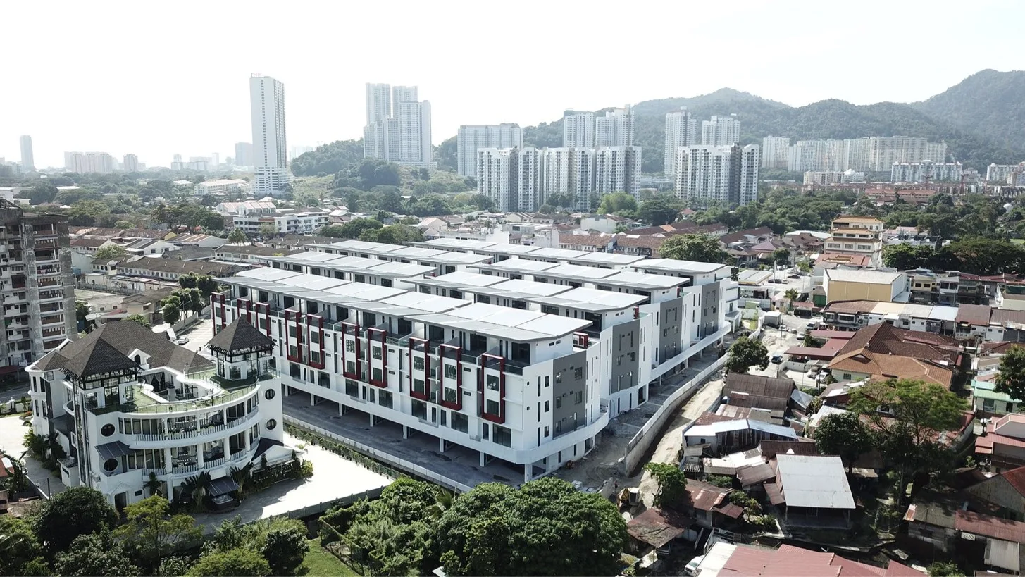 Aerial photograph of UL Residence with high-rises and hills behind, Air Itam, Penang — from the developer's project page
