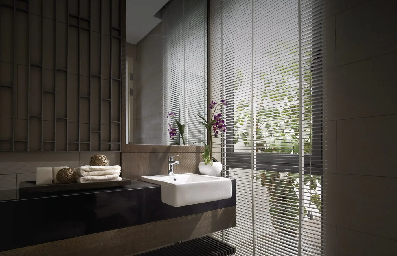 Vilaris Courtyard powder room with a basin beside a full-height window, interior image from the developer, Batu Uban, Penang