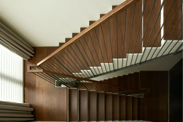 Vilaris Courtyard timber staircase seen from above through the stair void, interior image from the developer, Batu Uban, Penang